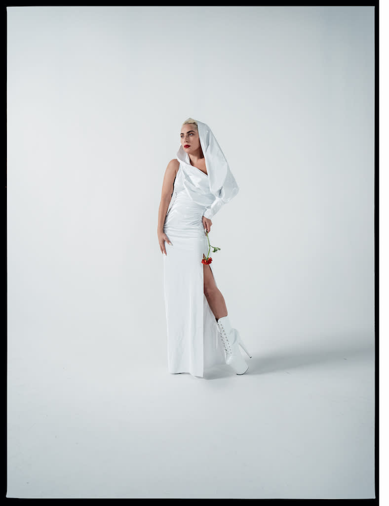 Lady Gaga poses in an all-white look for W Magazine’s Best Performances issue. - Credit: W Magazine