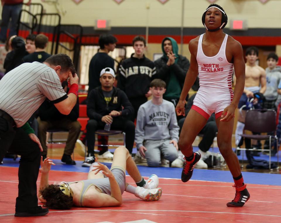 North Rockland's Justin Riello and Nanuet's Bobby Hardwick wrestle in the 138-pound weight class during the Rockland County wrestling championship at Tappan Zee High School Jan. 21, 2023. Riello won the match.