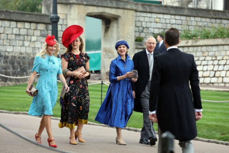 More colorfully dressed guests arrive for the ceremony