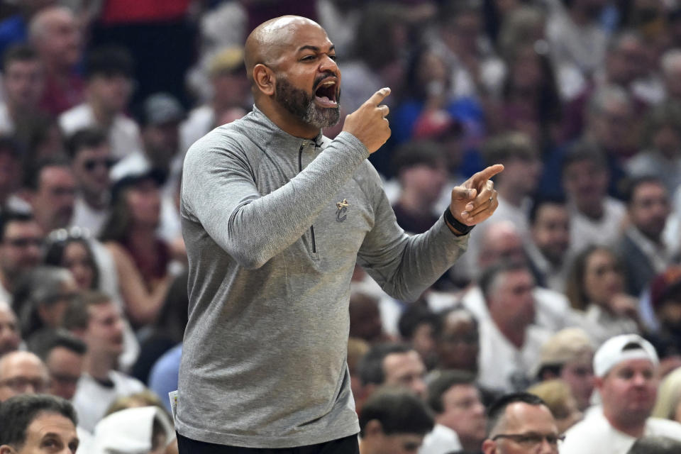 Cleveland Cavaliers coach J.B. Bickerstaff yells to players during the first half of Game 1 in a first-round NBA basketball playoffs series against the New York Knicks, Saturday, April 15, 2023, in Cleveland. (AP Photo/Nick Cammett)