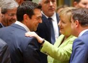 Greek Prime Minister Alexis Tsipras and German Chancellor Angela Merkel attend the EU summit in Brussels, Belgium, June 22, 2017. REUTERS/Francois Lenoir