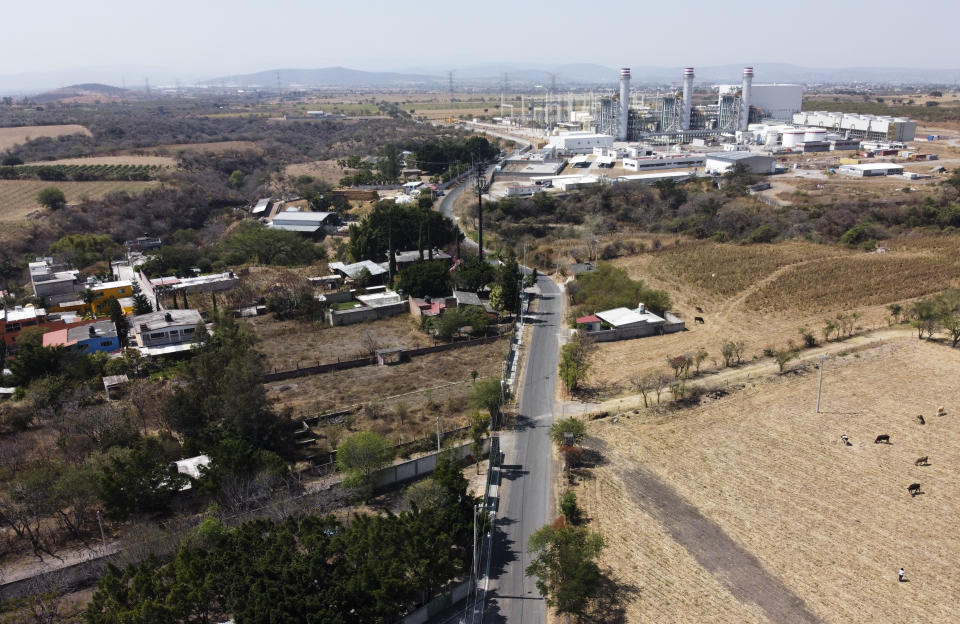 A newly built power generation plant stands idle near Huexca, Morelos state, Mexico, Saturday, Feb. 22, 2020. The power plant is at the heart of a years-long, contentious battle that calls into question the commitments of the new leftist government to indigenous land rights. (AP Photo/Eduardo Verdugo)
