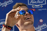 Los Angeles Dodgers' Enrique Hernandez is interviewed by reporters during Dodger Stadium FanFest Saturday, Jan. 25, 2020, in Los Angeles. (AP Photo/Mark J. Terrill)