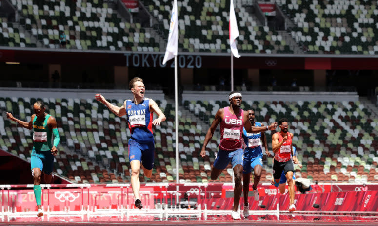 Karsten Warholm running in the 400-meter hurdles.