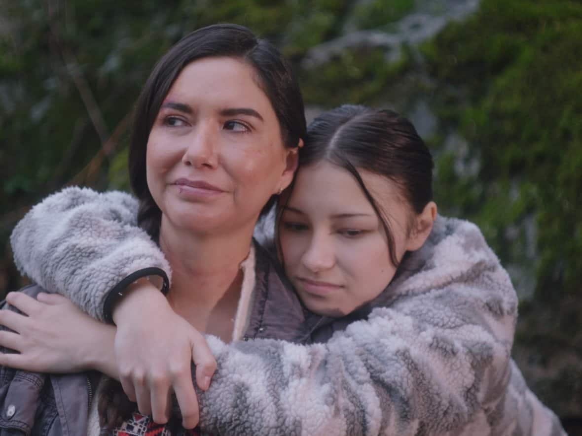 Sera-Lys McArthur (left) and Brooklyn Letexier-Hart (right) portray a mother and daughter escaping domestic violence in Broken Angel. (Submitted by VisJuelles Productions Inc. - image credit)