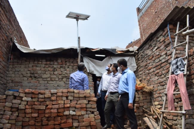 (R to L) Rockwell’s Chitrabhanu Ghosh, assistant general counsel; Naved Iqbal, India general manager; and Ankit Singh, India EHS lead, visit a recent installation.