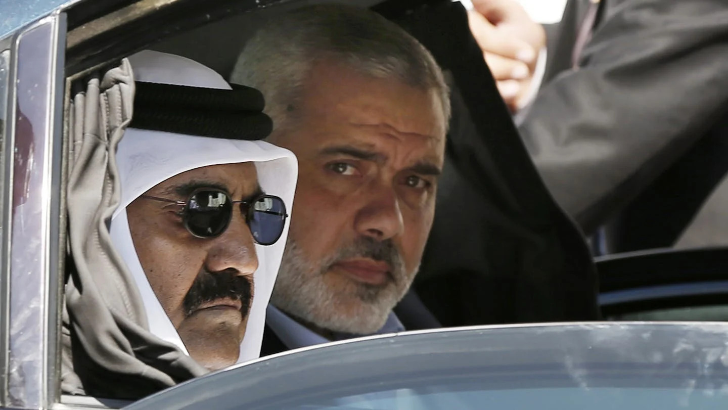 Then-Emir of Qatar Sheikh Hamad bin Khalifa Al Thani, left, and slain Hamas negotiator Ismail Haniyehin 2012. <a href="https://newsroom.ap.org/detail/HamasQatar/02df02ec34814d0ab07b7f64e5484f50/photo?Query=Al%20Thani%20%20Ismail%20Haniyeh&mediaType=photo&sortBy=arrivaldatetime:desc&dateRange=Anytime&totalCount=33&currentItemNo=4" rel="nofollow noopener" target="_blank" data-ylk="slk:AP Photo/Mohammed Salem;elm:context_link;itc:0;sec:content-canvas" class="link rapid-noclick-resp">AP Photo/Mohammed Salem</a>