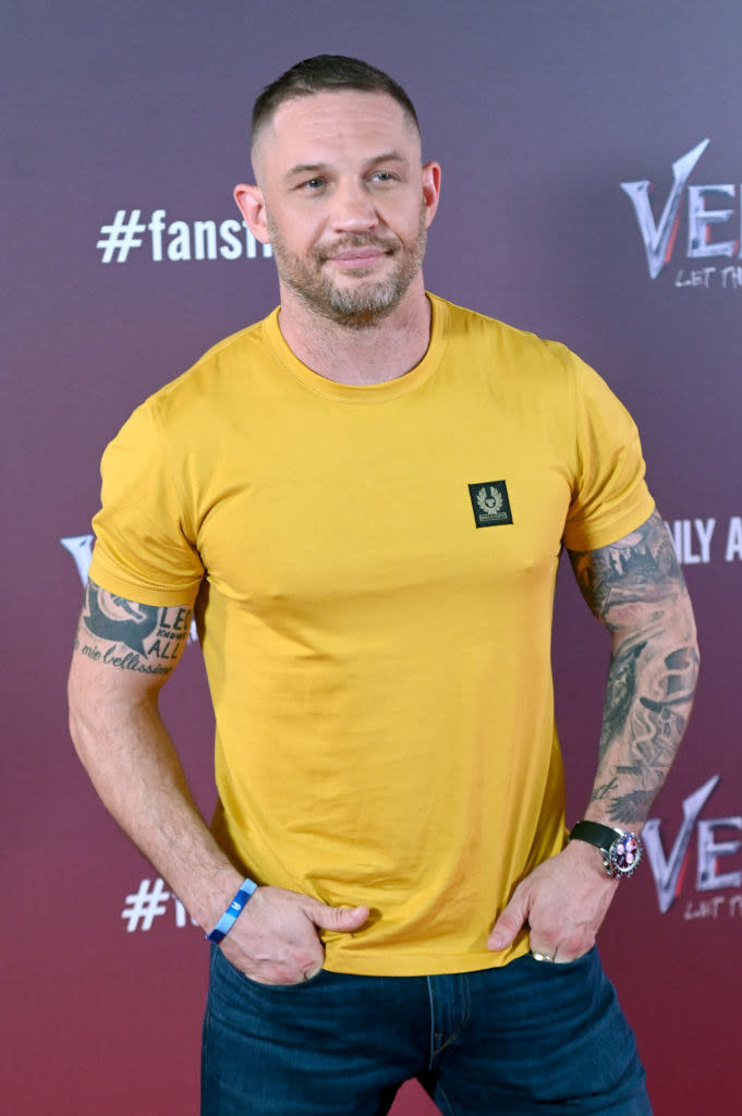 Tom Hardy posing on a red carpet