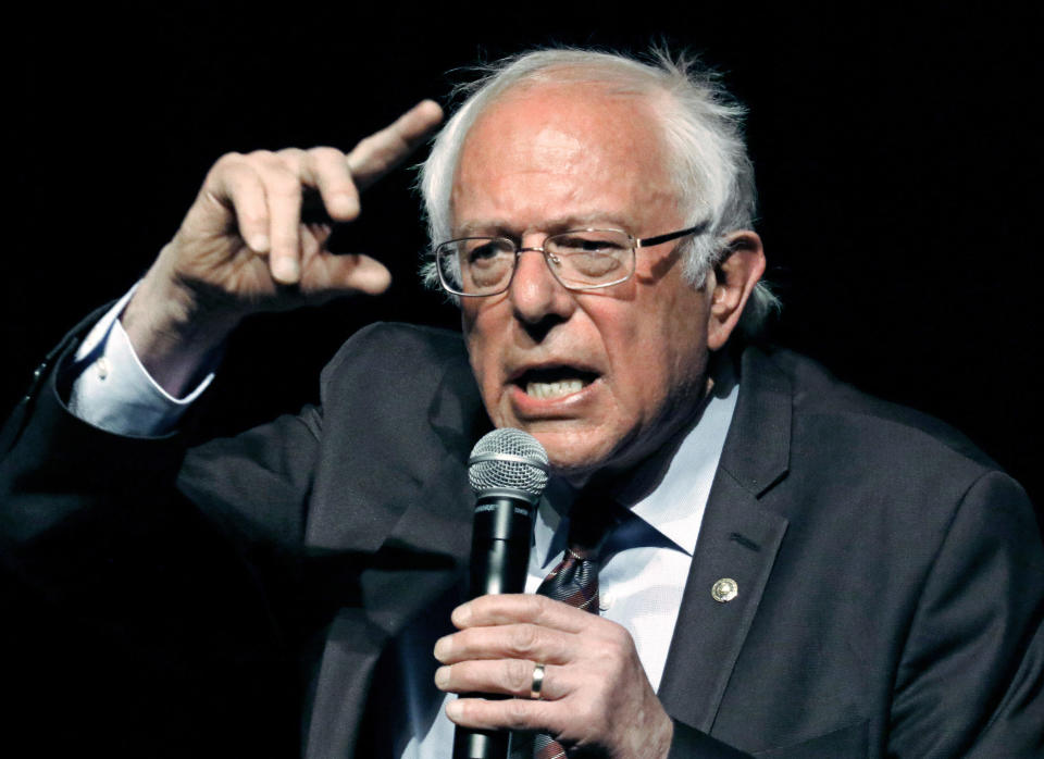 FILE - In this April 4, 2018, file photo, Sen. Bernie Sanders, I-Vt., responds to a question during a town hall meeting in Jackson, Miss. Sanders’ “Medicare for all” plan would increase government health care spending by $32.6 trillion over 10 years, according to a study by a university-based libertarian policy center. (AP Photo/Rogelio V. Solis, File)