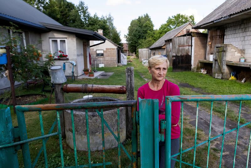 Village head Agata Moroz stands in front of her house in Kolpin-Ogrodniki