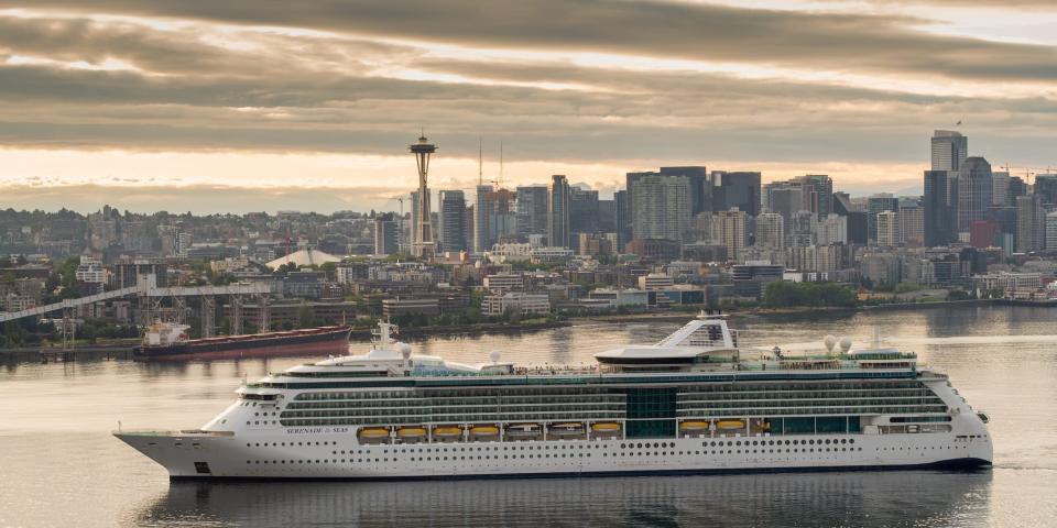 the Serenade of the Seas in the water with the Seattle skyline in the back