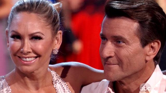 Though <em>Shark Tank</em> star Robert Herjavec and his partner Kym Johnson were eliminated on Tuesday night's <em>Dancing With the Stars</em>, turns out they've found something better than the coveted Mirror Ball trophy -- love! The reported couple have remained tight-lipped about their romance all season long. But on their last episode, viewers saw adorable footage from their rehearsals, when the 51-year-old multimillionaire tech mogul was caught whispering, "I love you," to the 38-year-old dancing pro. ABC PHOTOS: Complete List of 'Dancing With the Stars' Winners A source tells ET that the two have been dating since the beginning of the show, and that they "are inseparable and madly in love." ABC But despite their exciting new romance, Herjavec evaded the question when <em>DWTS</em> host Tom Bergeron pressed him on Tuesday night's episode. "I've known Kym, we've been friends for years, and Robert, you may not have won the Mirror Ball trophy but I'm suspecting you've won someone's heart," Bergeron said. "Tom, I'm not sure I feel that way about you," the businessman joked back. The new relationship is coming at a good time in Herjavec's life -- in March, he confirmed that he split from his wife of 24 years, Diane Plese, and admitted he felt suicidal after their breakup. "I just wanted to end it," he told <em> People </em>about a scary incident last July when he contemplated jumping off the balcony of his Toronto hotel room. "It's been a terribly difficult year." In March, ET Canada caught up with the newly eliminated couple, when Herjavec acknowledged his trying year and the great timing of his <em> DWTS</em> gig alongside Johnson. "This couldn't come at a better time in my life for me, right?" he said. "You know, I'm just trying to stay positive and Kym's yelling at me a lot, so that's a little negative, but I'm getting used to it," he joked. NEWS: Which Two Couples Went Home on 'DWTS' Last Night? Watch the adorable couple below!