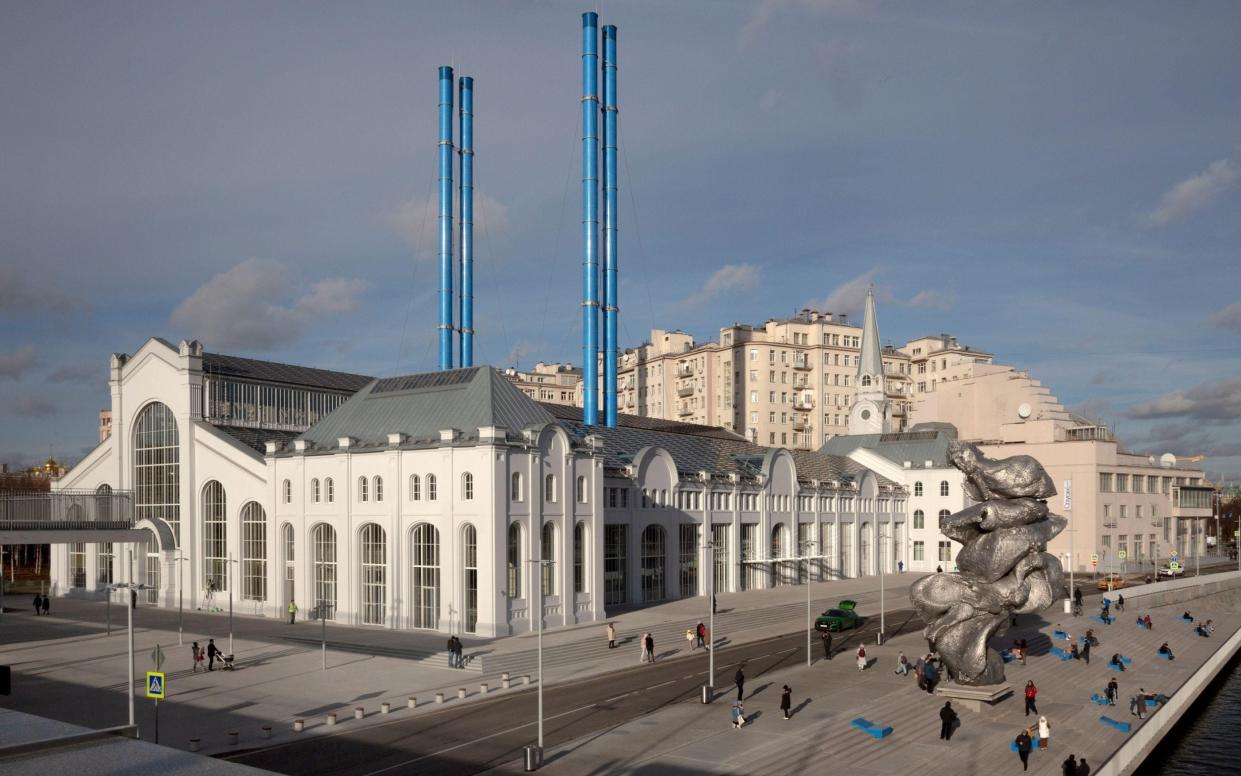 A view of the renovated power station with large glass windows and a fresh white facade - Nikolay Vinokurov / Alamy Stock Photo