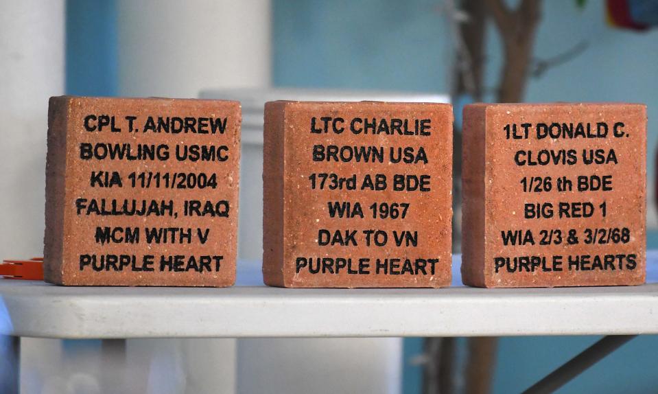 Commemorative bricks honoring Purple Heart recipients are displayed in August 2020 before installation at the Brevard Veterans Memorial Center plaza on Merritt Island.