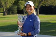 Danielle Kang poses with the trophy after winning the Marathon Classic LPGA golf tournament Sunday, Aug. 9, 2020, at Highland Meadows in Sylvania, Ohio. (AP Photo/Gene J. Puskar)