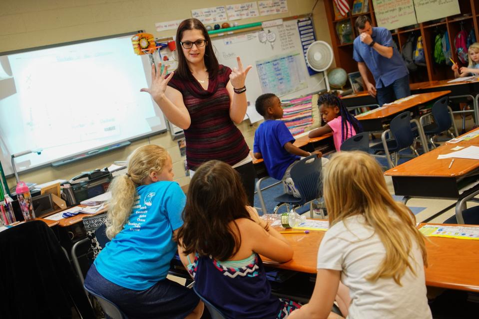 Erin Furman, a teacher resident at Cedar Lane Elementary School, leads a second-grade class in a math lesson in this 2017 file photo.