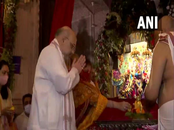 Amit Shah performs 'Jalabhishek' at ISKCON temple in Gujarat's Ahmedabad. (Photo/ANI)