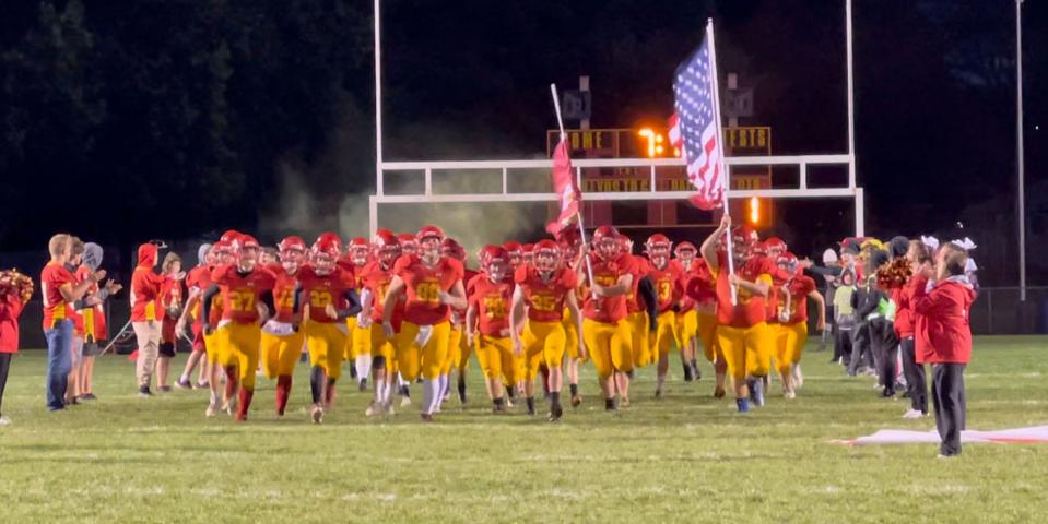 The Girard football team takes the field before its game with North East on Saturday, Oct. 16, 2021, in Girard.