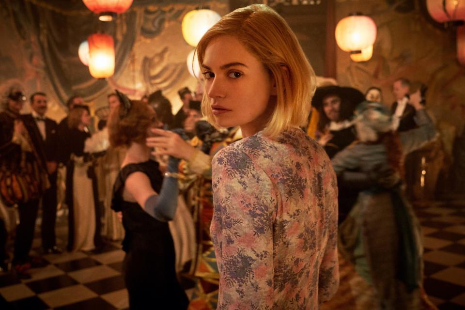 Mrs. de Winter (Lily James) has a rough time at a masquerade ball in "Rebecca."