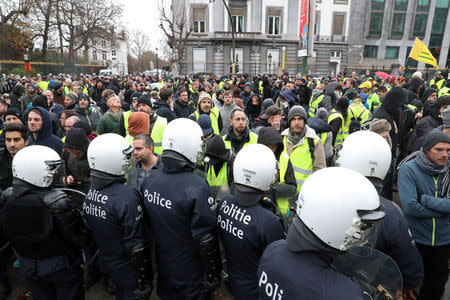 Demonstrators attend the "yellow vests" protest against higher fuel prices, in Brussels, Belgium, December 8, 2018. REUTERS/Yves Herman