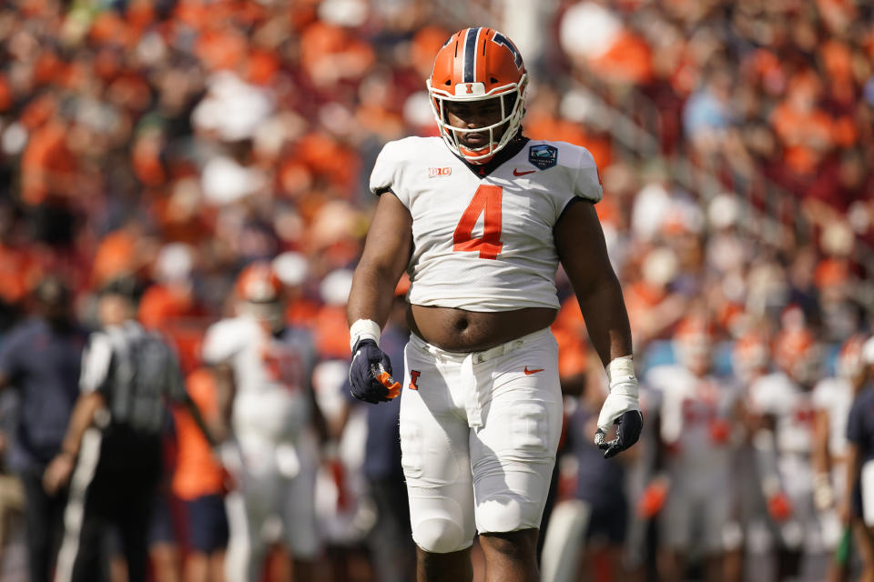 TAMPA, FL - JANUARY 02: Illinois Fighting Illini defensive lineman Jer'Zhan Newton (4) walks on the field during the ReliaQuest Bowl college football game between the Illinois Fighting Illini and the Mississippi State Bulldogs on January 02, 2023, at Raymond James Stadium in Tampa, FL.  (Photo by Chris Leduc/Icon Sportswire via Getty Images)