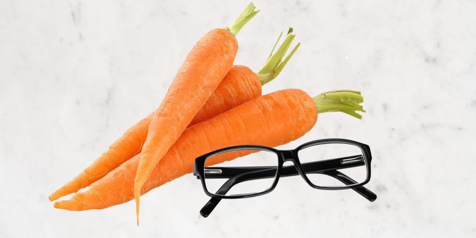 a pair of glasses next to a couple of carrots