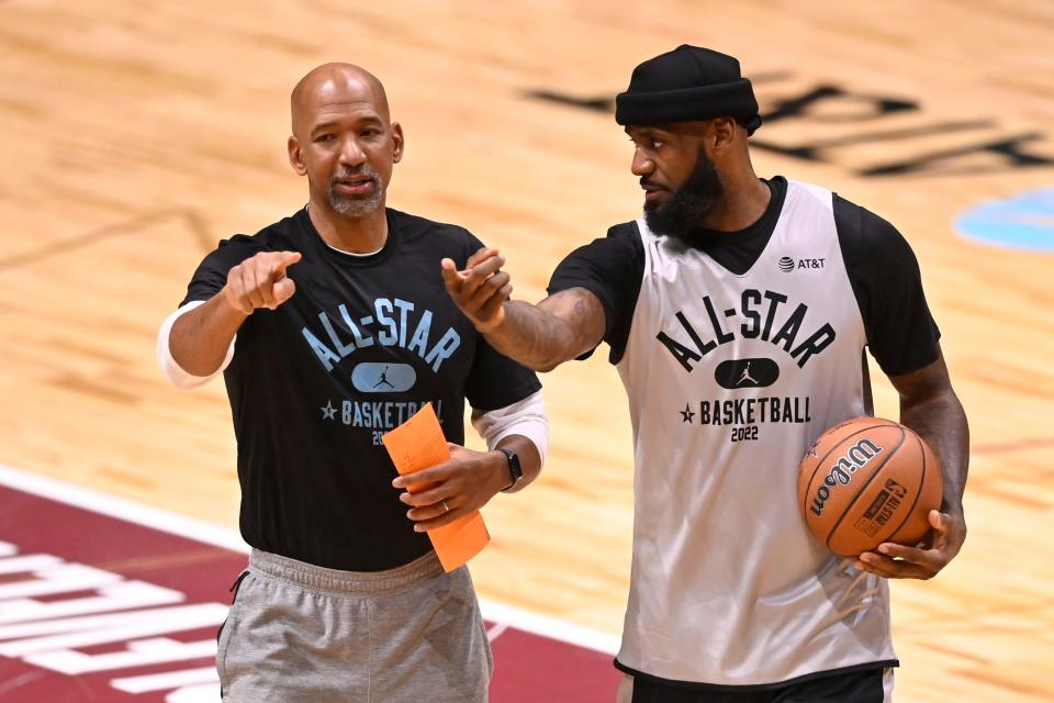 Team LeBron head coach Monty Williams, left, talks with Los Angeles Lakers forward LeBron James during the NBA All-Star practice, Feb. 19, 2022, at Wolstein Center in Cleveland.