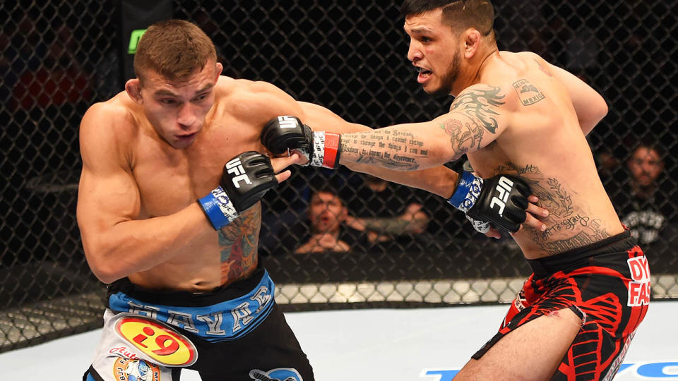 Efrain Escudero punches against Rodrigo de Lima in 2015. (Photo by Josh Hedges/Zuffa LLC/Zuffa LLC via Getty Images)