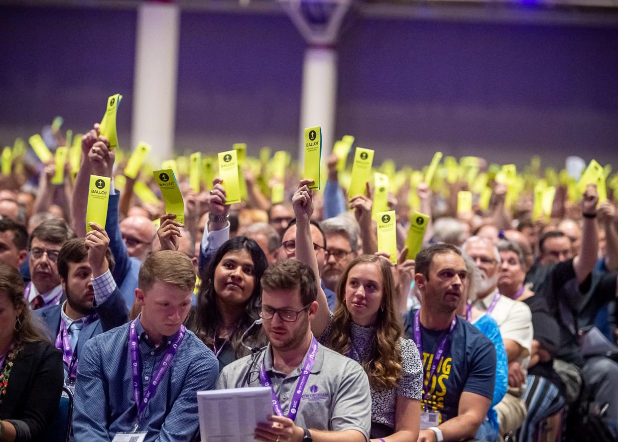 Delegates called messengers use yellow ballots to vote on Tuesday, June 13, at the Southern Baptist Convention at the New Orleans Ernest N Morial Convention Center.