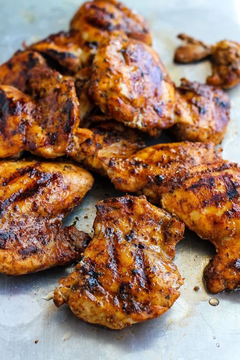 spice rubbed grilled chicken on pan