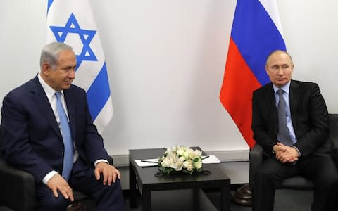 Benjamin Netanyahu (left) has tried unsuccessfully to convince Vladimir Putin (right) to rein in Iran in Syria - Credit: Photo by Mikhail Metzel\\TASS via Getty Images