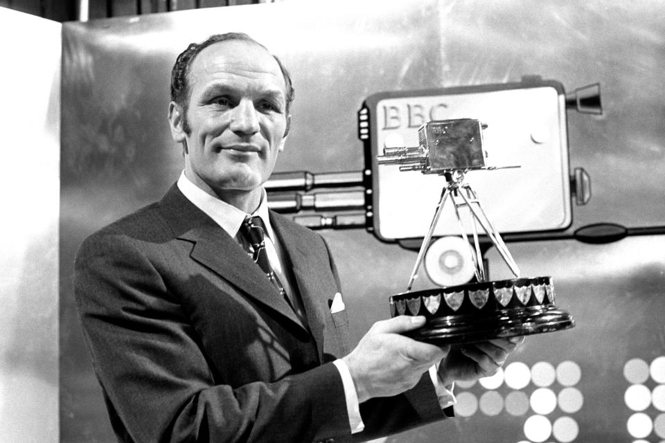 Henry Cooper with the BBC Sports Personality of the Year Award at the BBC TV Theatre in Shepherd's Bush, London. The heavyweight boxing champion had previously won the award in 1967.