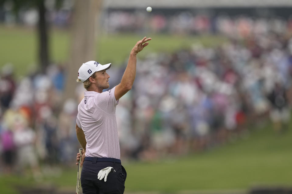 Will Zalatoris catches his ball on the eighth hole during the second round of the PGA Championship golf tournament at Southern Hills Country Club, Friday, May 20, 2022, in Tulsa, Okla. (AP Photo/Matt York)