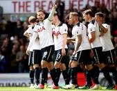 <p>Tottenham celebrate their fourth goal</p>