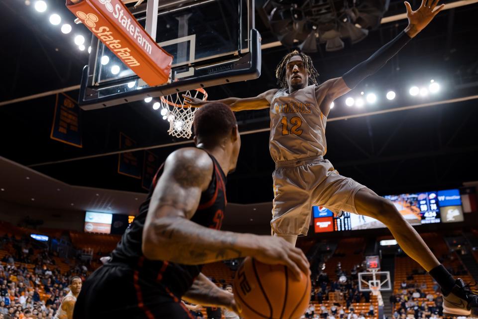 UTEP's Jamari Sibley (12) attempts to block Southern Utah's pass at the second round of the Basketball Classic Tuesday, March 22, 2022, at the Don Haskins Center in El Paso, Texas.