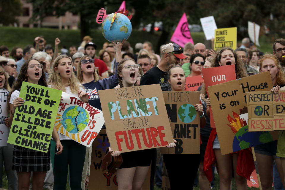 Climate protesters demonstrate on Sept. 20, 2019 in Kansas City, Mo. Across the globe, hundreds of thousands of people took the streets to demand that leaders tackle climate change in the run-up to a U.N. summit. (Charlie Riedel/AP)