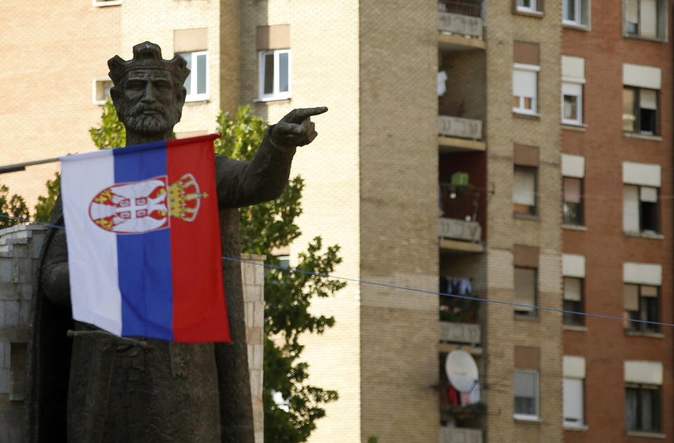 A Serbian flag flutters in front of the monument of late Serbian Duke Lazar who was killed in the Battle of Kosovo in June 1389, in the northern, Serb-dominated part of Mitrovica, Kosovo, Friday, Sept. 7, 2018. The idea of ​​a "land swap" between Serbia and Kosovo to resolve their long-running dispute once and for all has stirred passions ahead of a new round of talks between former war foes. (AP Photo/Darko Vojinovic)