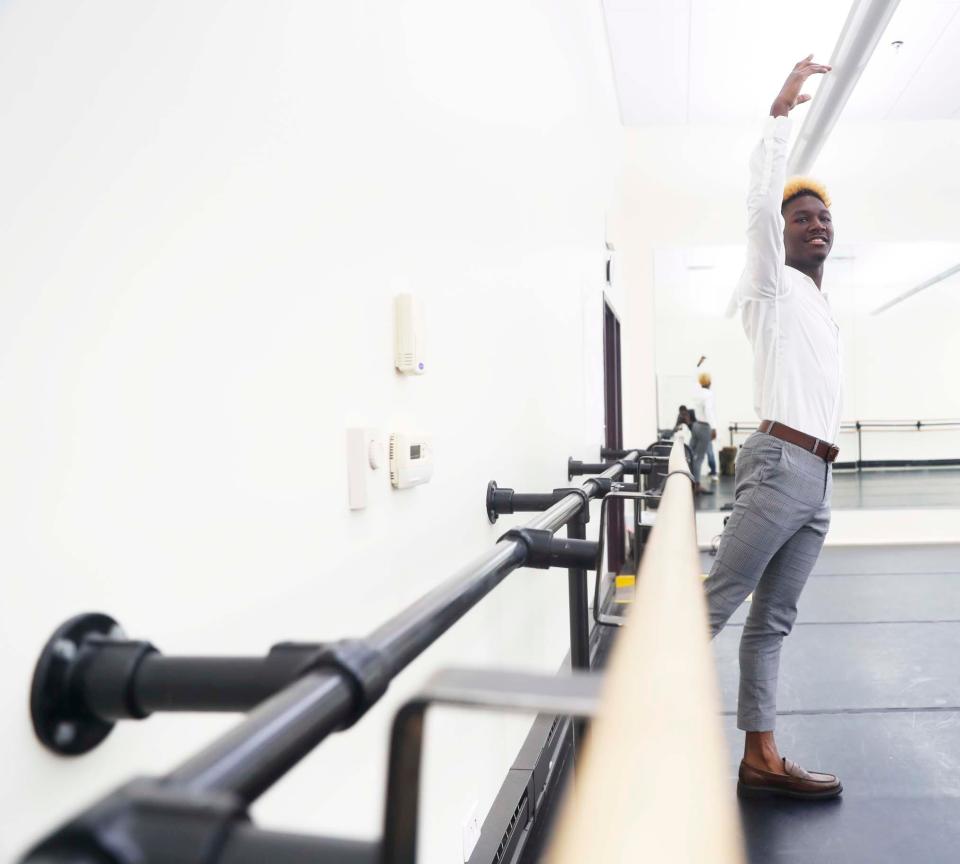 Roman Neal, a student of New Ballet Ensemble, was awarded with a full ride scholarship to Howard University. The scholarship is named in honor of Chadwick Boseman. Roman strikes a ballet pose in the dance studio of New Ballet Ensemble on July 20. 2023 in Memphis, Tenn.