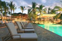 <p><em>La Romana, Dominican Republic</em></p>   <p>Casa de Campo means “house in the country”—as in a Kennedy-esque compound designed by Oscar de la Renta. Worried you’ll weigh too heavily in the lap of luxury after indulging in the sybaritic spa and fine dining? offers tennis (13 courts), horseback riding, Sporting Clays Shooting Center replete with safari-themed clubhouse, and sailing or fishing (deep sea and freshwater) from the Portofino-inspired marina. Golfers snarl at “Teeth of the Dog,” a Peter Dye-abolical design featuring seven water holes, trademark railroad tyes, wicked bunkers, sharp drops in elevation, and unfair fairways.</p>   <p><strong>Insider Tip:</strong> Shop and dine at , a not-cheesy replica of a 16th century Mediterranean village replete with narrow cobblestone streets and crenellated stone castles.</p>   <p><strong>Plan Your Trip: </strong>Visit </p>