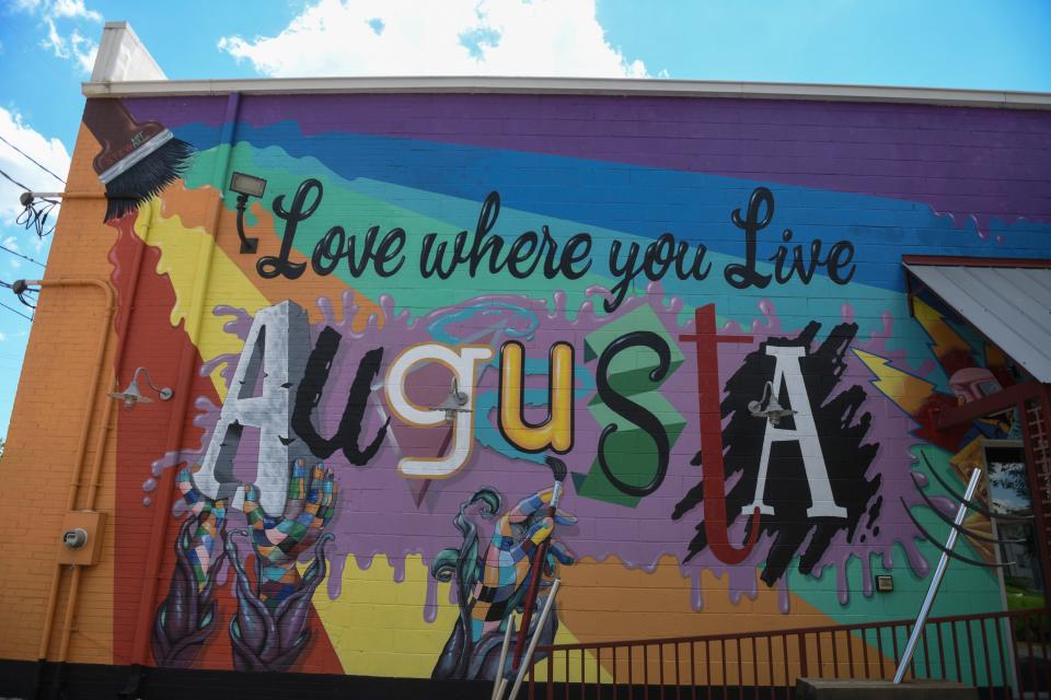 Brian Stewart’s “Love Where You Live” mural on the side of The 523 Gallery in Augusta, Ga., on Thursday, Aug. 17, 2023.