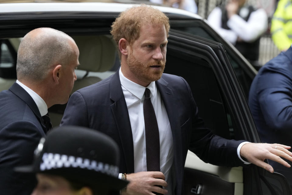 Prince Harry arrives at the High Court in London, Tuesday, June 6, 2023. Prince Harry is due at a London court to testify against a tabloid publisher he accuses of phone hacking and other unlawful snooping. Harry alleges that journalists at the Daily Mirror and its sister papers used unlawful techniques on an "industrial scale" to get scoops. Publisher Mirror Group Newspapers is contesting the claims. (AP Photo/Frank Augstein)