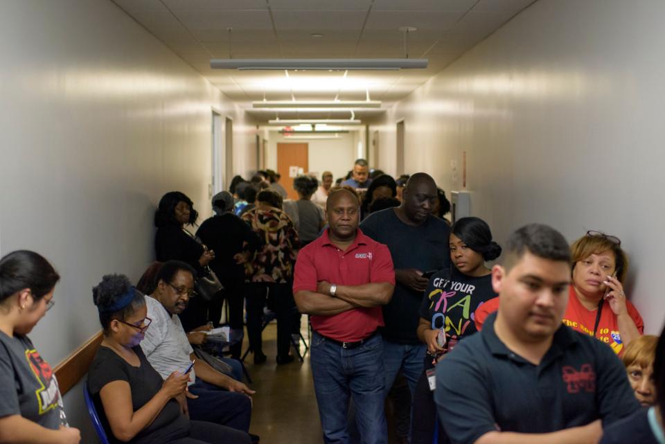 Voters line up at a polling station during the presidential primary in Houston on March 3, 2020. (Photo: MARK FELIX via Getty Images)