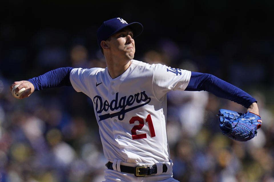 Los Angeles Dodgers pitcher Walker Buehler pitches during the first inning against the Atlanta Braves in Game 3 of baseball's National League Championship Series Tuesday, Oct. 19, 2021, in Los Angeles. (AP Photo/Jae Hong)