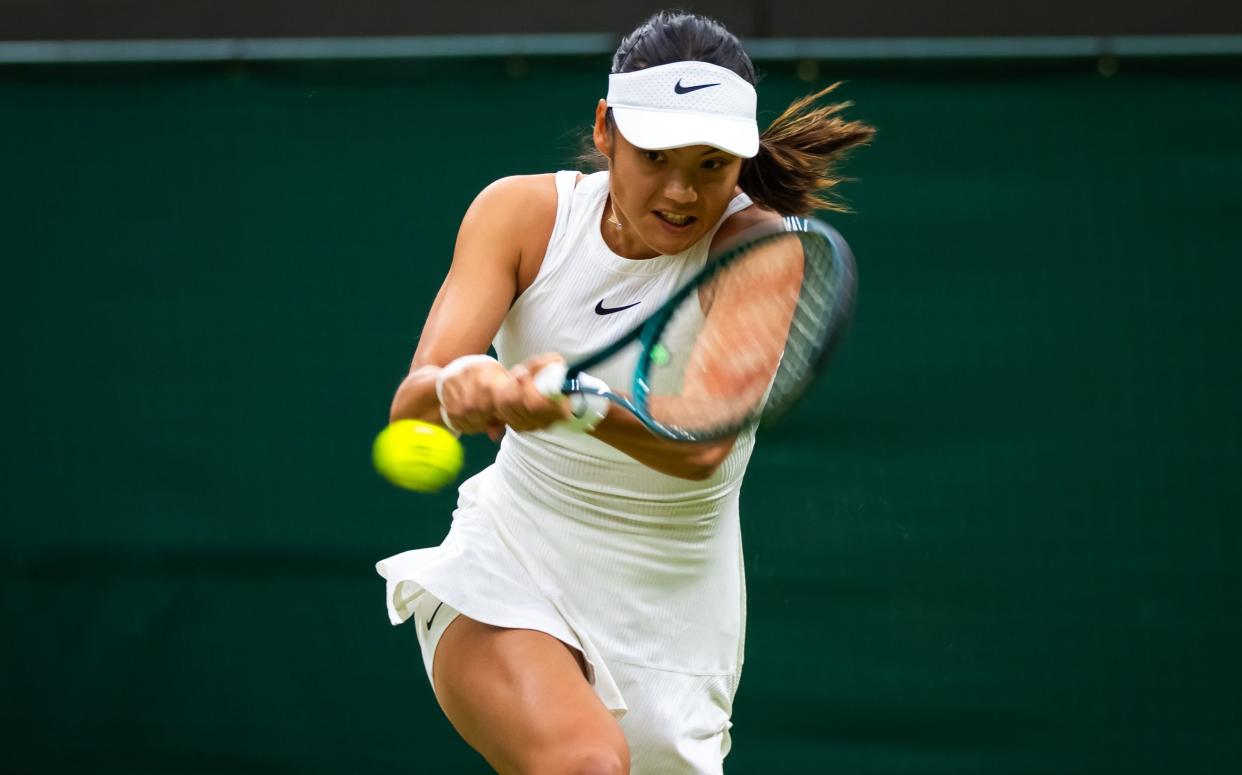 Emma Raducanu of Great Britain in action against Elise Mertens of Belgium in the second round on Day Three of The Championships Wimbledon 2024 at All England Lawn Tennis and Croquet Club on July 03, 2024 in London, England