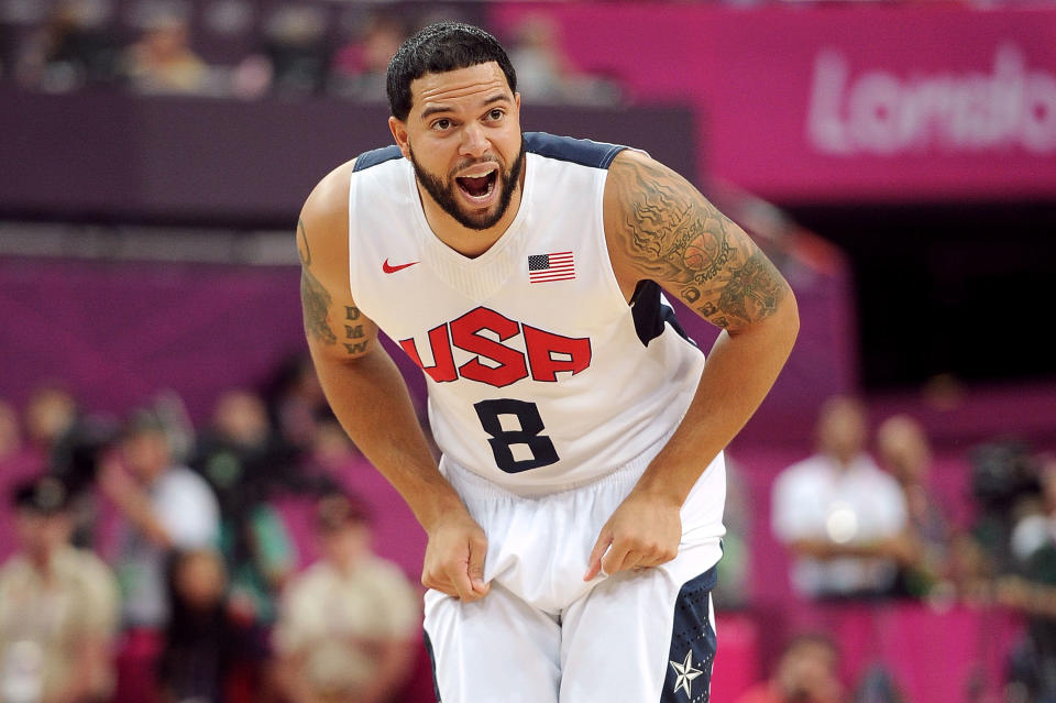 LONDON, ENGLAND - AUGUST 12: Deron Williams #8 of the United States yells to his team mates during the Men's Basketball gold medal game between the United States and Spain on Day 16 of the London 2012 Olympics Games at North Greenwich Arena on August 12, 2012 in London, England. (Photo by Harry How/Getty Images)