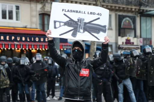 The yellow vest movement and rights groups want the LBD launchers banned; some French MPs are pushing to ban demonstrators from wearing masks