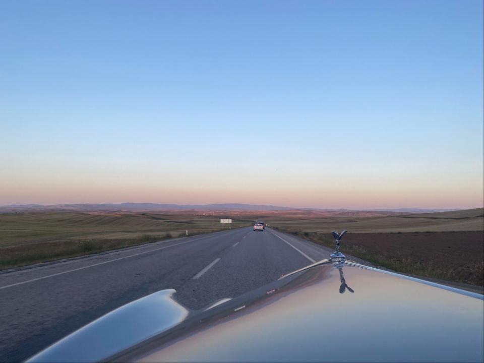 The view from the interior of a car.