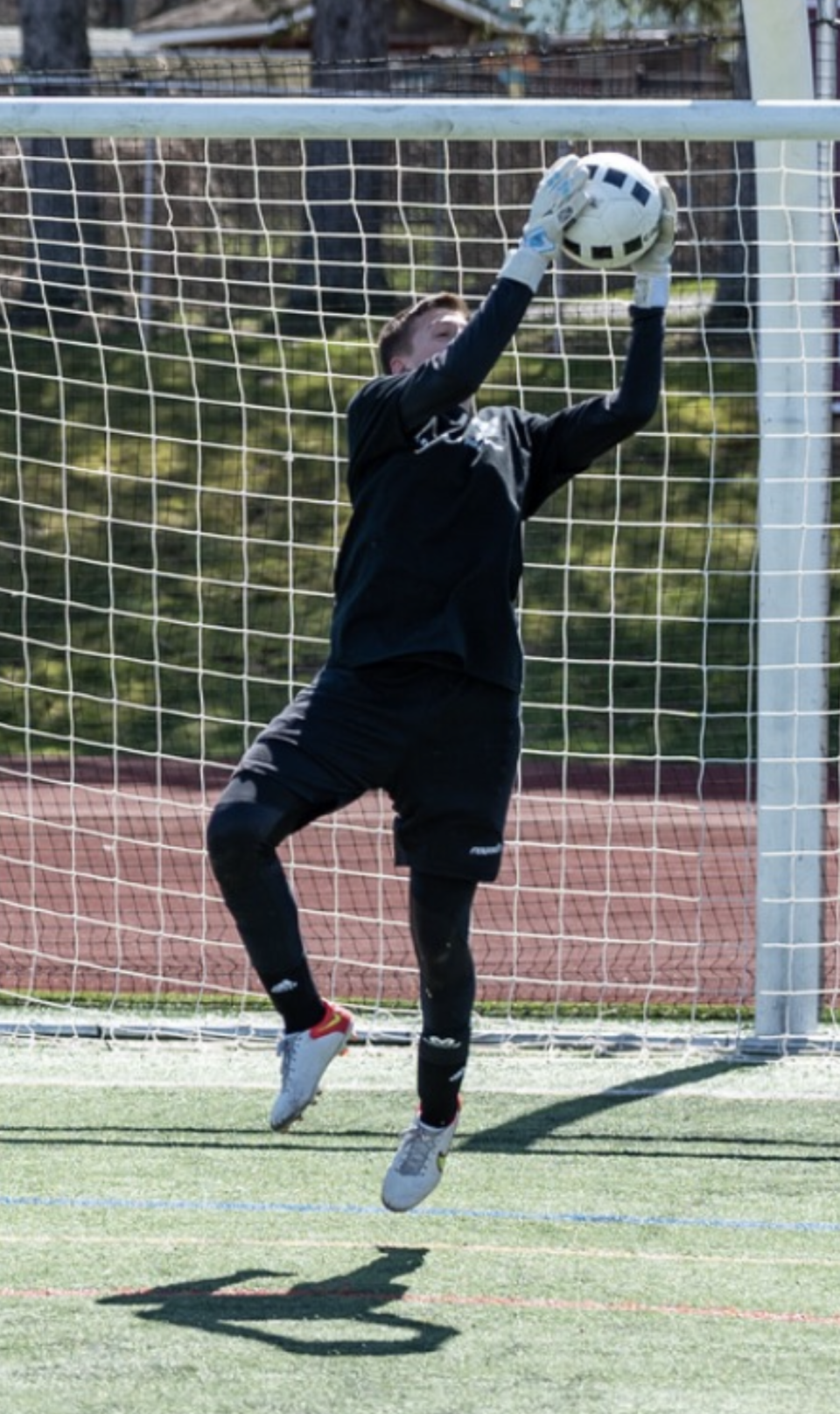 Marlboro goalkeeper Alex McAteer is photographed making a save.