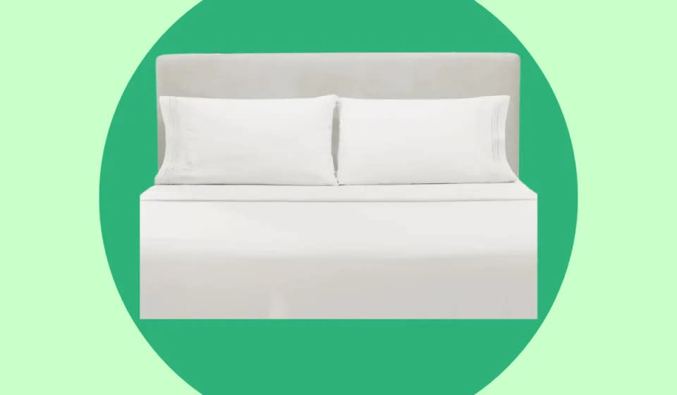 White bedsheets and pillows on a bed.