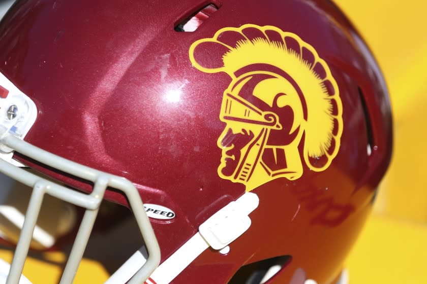 A USC helmet sits on the bench in the second half, during a game against BYU.